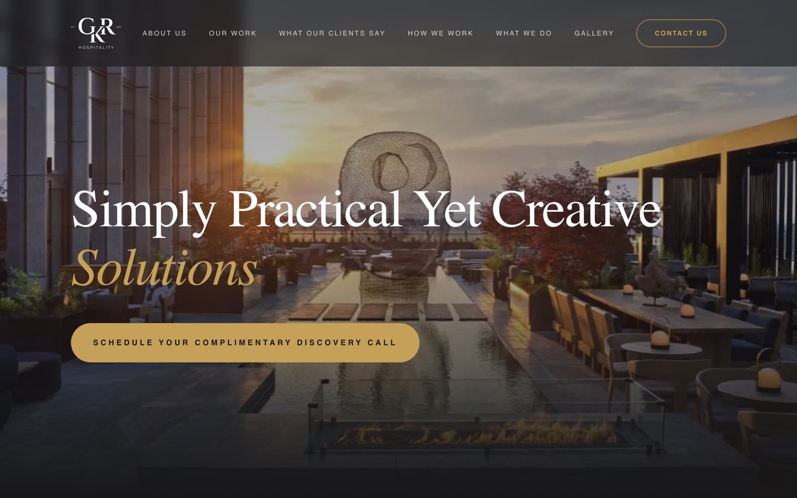 The GKR Hospitality home page: a rooftop terrace at sunset behind the headline “Simply Practical Yet Creative Solutions” and a gold button to schedule a discovery call.